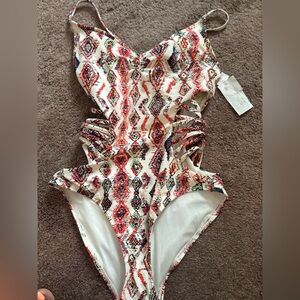 One piece bathing suit with side cut outs